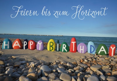 Geburtstag - bunte Steine am Meer